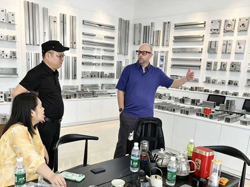 US Clients Visit Yuebao Technology for Custom Aluminum CNC Solutions