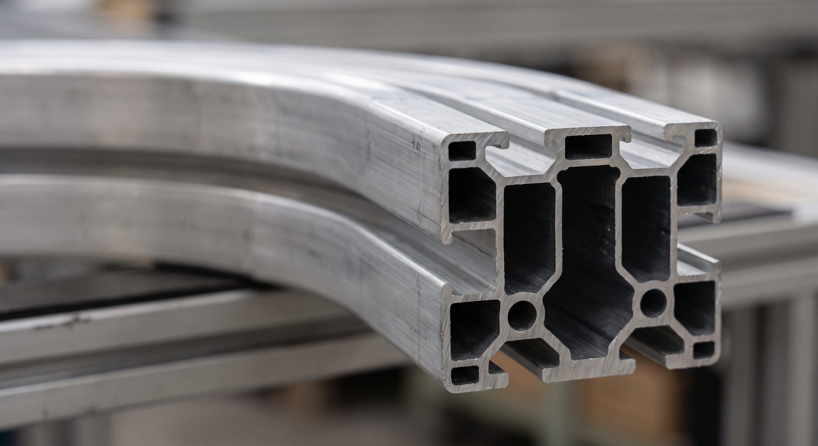 Custom stretch bending aluminum profiles for battery packs and EV frames